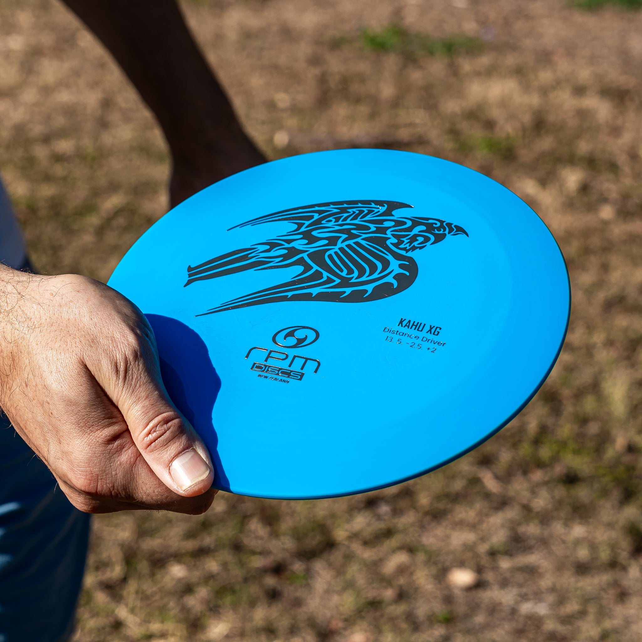 RPM Discs Kahu XG in Atomic being held ready to throw